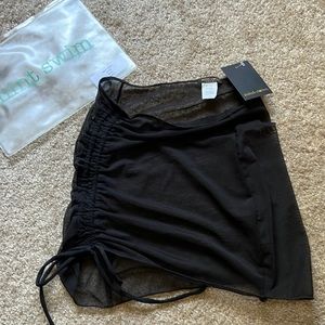 MINT SWIM black coverup skirt. Brand new with tags. Size small.